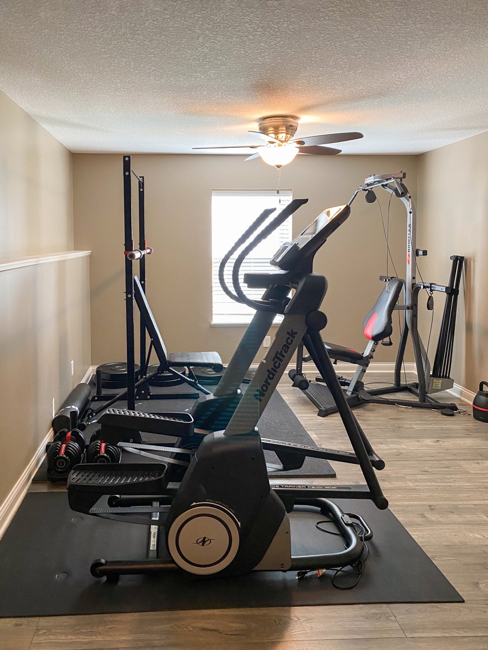A residential personal gym includes work out equipment recently renovated by House Lift Inc. of the Twin Cities
