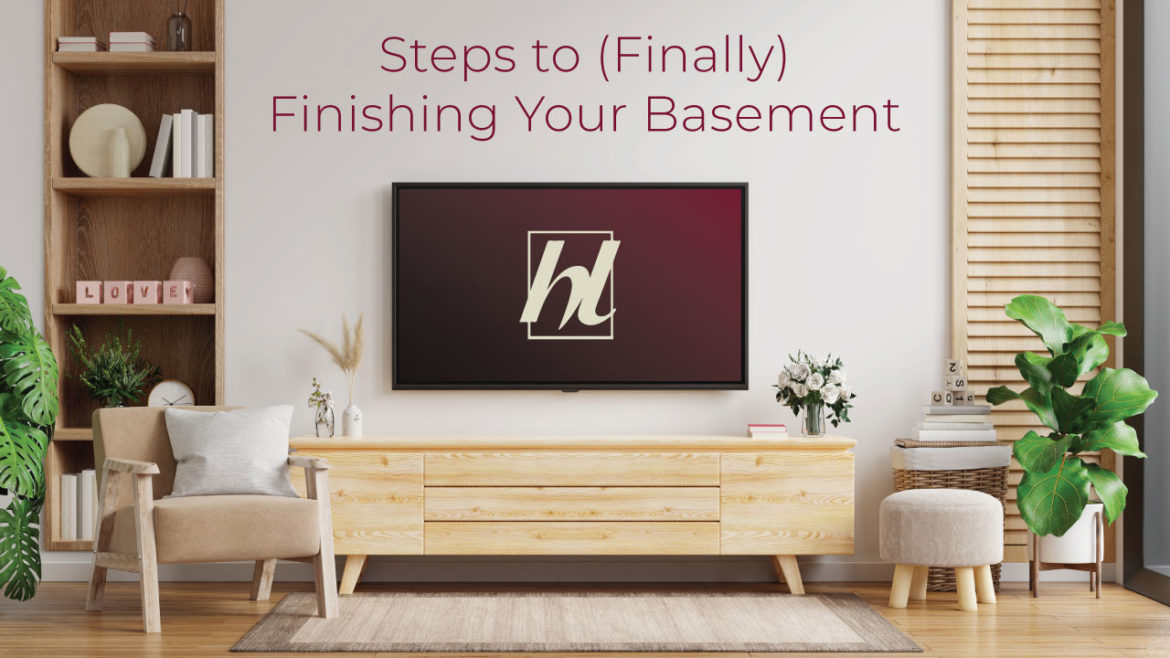 A modern living room with text Steps to (Finally) Finishing Your Basement for House Lift Blog Banner